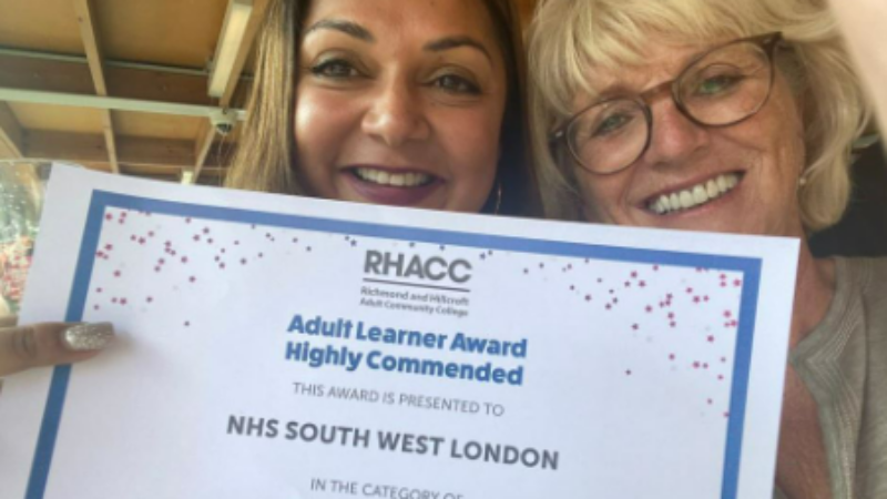 Anisha Patel and Wendy Majewska with their Community Partner of the Year Award