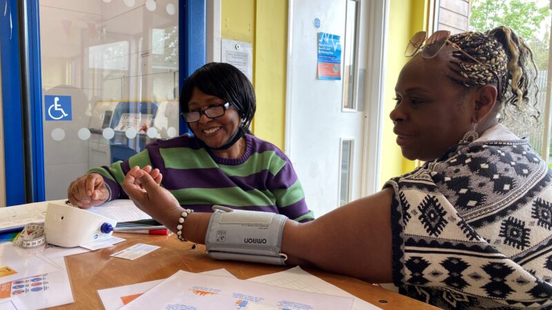 A woman receiving a health check