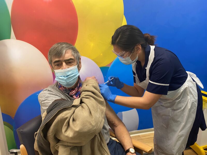 A Richmond resident getting their Covid-19 vaccination in a South West London vaccination centre