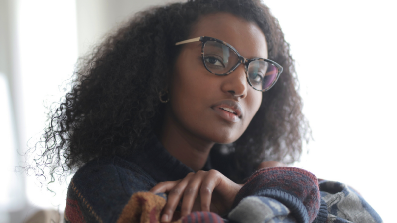 Girl in glasses looking at the camera