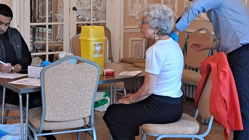 Richmond resident Diane receives a flu vaccination