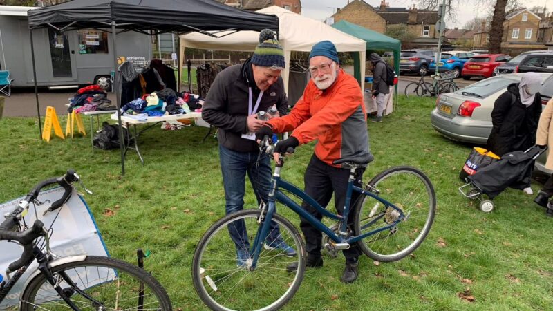 A Cambridge Road residents gets fitted for a free bike at an RBKares health and wellbeing event